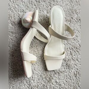 Katy Perry. New without tags. Size 9. Cream Heels with Pearl Accent